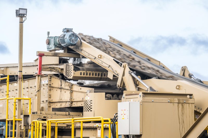 Screen decks and conveyors on a processing plant